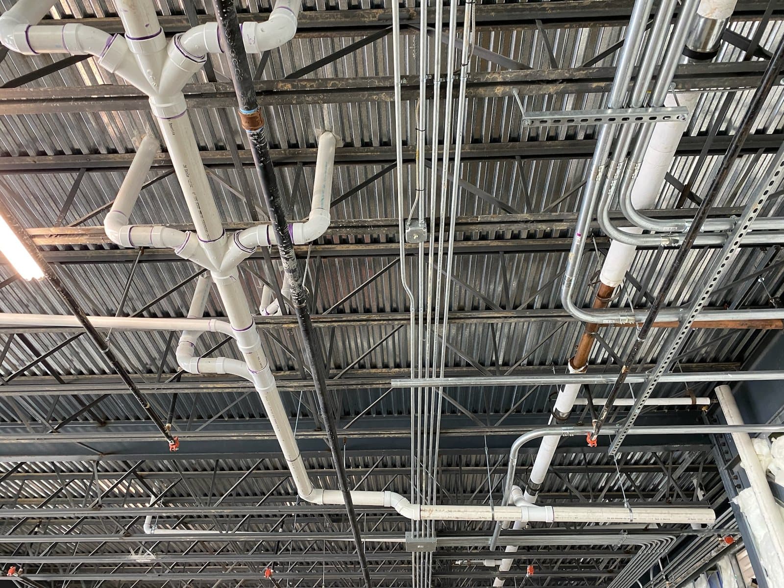 Commercial overhead plumbing and drain lines