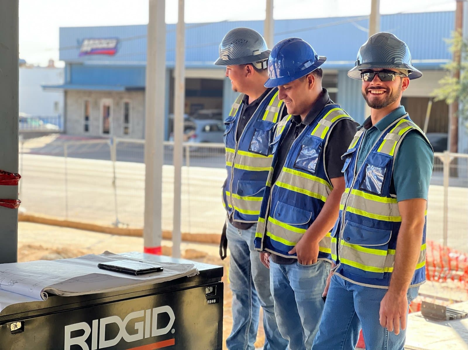 Streamline Service crew in safety vests on a commercial construction site