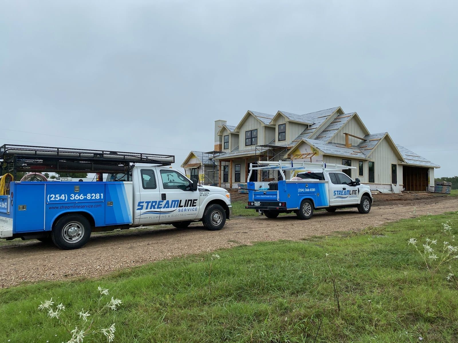 Streamline Service trucks parked at a residential service call